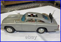 1960's Japan Battery Operated 007 James Bond Tin Toy Aston Martin