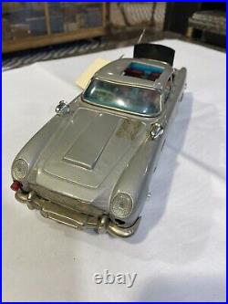 1960's Japan Battery Operated 007 James Bond Tin Toy Aston Martin