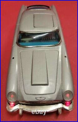1965 James Bond 007 Aston Martin DB5 Tin Battery Op Car WithBox Gilbert WORKING