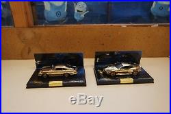 2 x Minichamps 1/43 Aston Martin DB5 & DBS James Bond Collection Gold Plated T1
