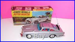 Gilbert James Bond Aston Martin 1965 Tin Toy Battery Operated with Original Box