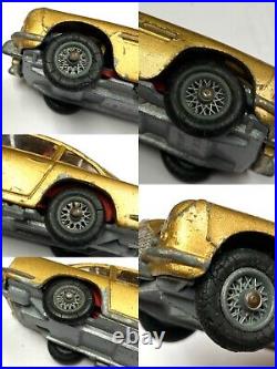 Original James Bond Aston Martin DB5 Corgi Toys 75% condition lot of wear marks