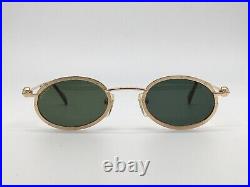 Sonnenbrille Vintage ASTON MARTIN AM 34 gold oval James Bond Gr. M 1990er Etui