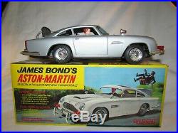 Vintage Battery Operated 007 James Bond Aston Martin Toy Car By Gilbert Mint In